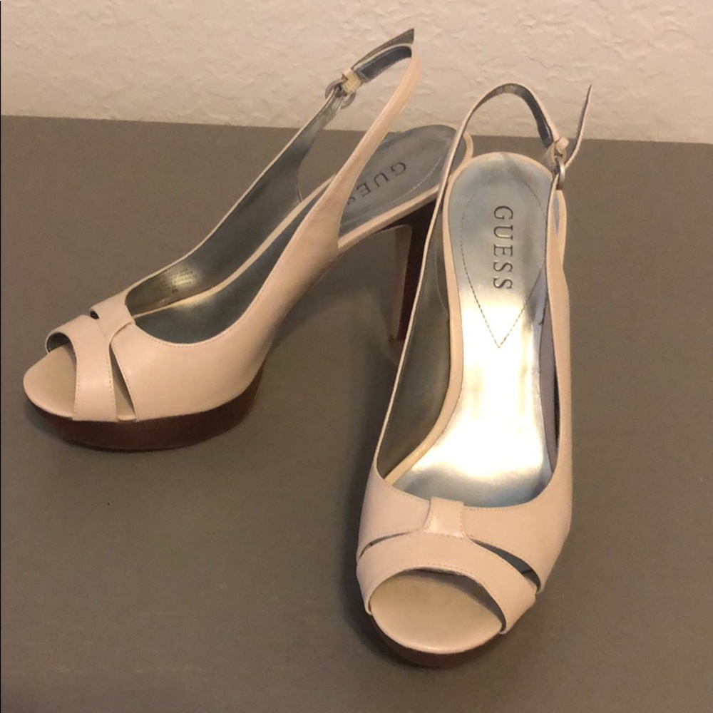 Guess blush pink leather platform heels.